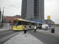 An East Didsbury bound tram departs Rochdale Town Centre.  J Dillon
